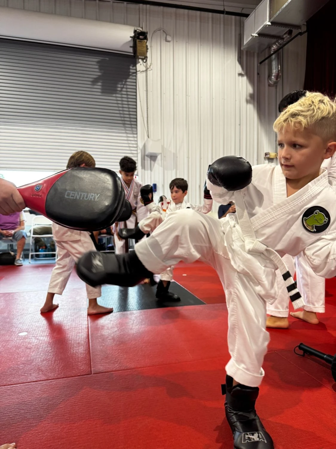 New Transform Martial Arts student learning stance in class